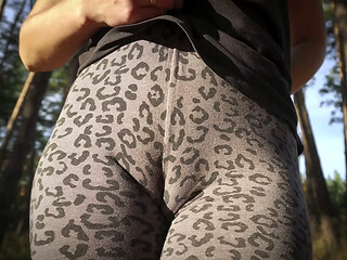 Girl Teases Her Big Cameltoe In Leopard Leggings Outdoors
