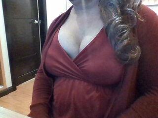 Indian crossdresser in red midi dress and cardigan