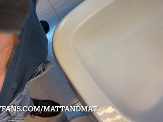 Ginger jerks off in the bathroom at work