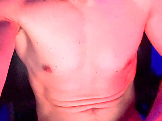 Athletic hunk jerking big cock