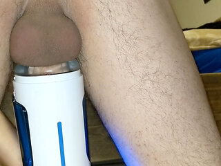 closeup pulsating cock milking cumshot from behind with milking machine, moaning