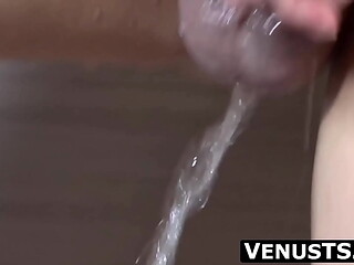 Big tits Asian tranny Venus Luxx is fullfiling our fantasies washing her smoking hot body while slowly wanking her big cock.