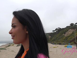 Latina beauty Anissa Kate enjoys riding in a car on the beach