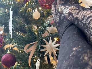 Playing with a christmas three with my legs in stockings