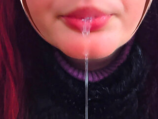 Kinky girl Ana Liz sucks a thick icicle in secret..