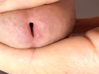 Extreme closeup of big and loud flowing ejaculation
