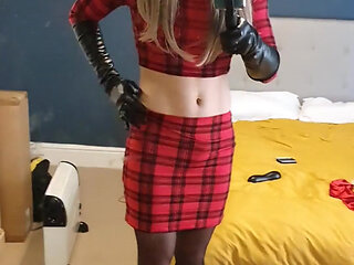 Showing off red tartan skirt