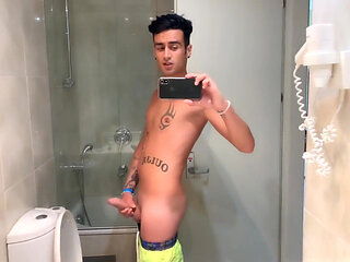 Quick Hotel Bathroom Cumshot Into Sink in Swim Trunks While Friend Is Gone