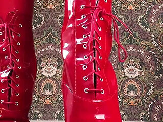 Red Ballet Boots on Wooden Floor