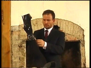 Tied up woman with clitoris piercings, sodomized by a stick