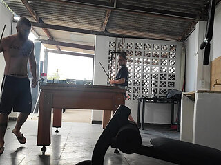 Camera films straight players playing pool and naked