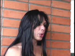 Brunette tranny with tattoos sucks and rides muscular stud's cock