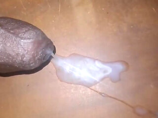 Cum poured out of the big black cock