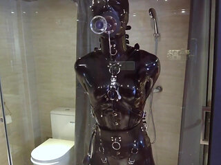 Mz20 - the Girl in Latex Clothing Locked in a Glass Room