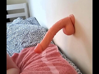 Sissy takes huge dildo doggy style