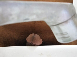 Gay handjob and cumming in a rowboat on a lake in the Alps.
