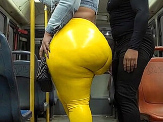 "Masked BBW Teases Huge Ass in Shiny Yellow Leggings on Public Bus"