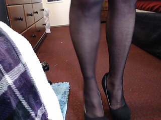 Putting on black pantyhose tease