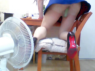 A seductive college bitch plays alone inserting cucumber, bottle, and a syringe of egg into her sissy pussy.