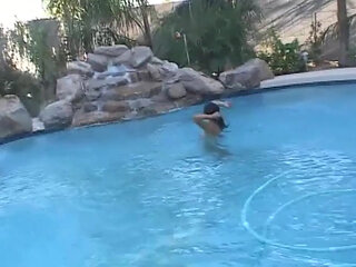Hot Young Shemale Gets a Naked Swim in the Pool