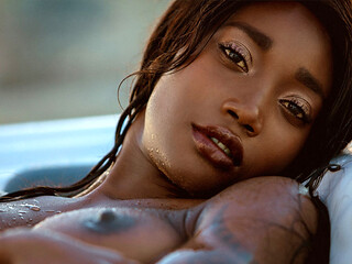 Ebony teenie showcases her sweat-soaked black beaver