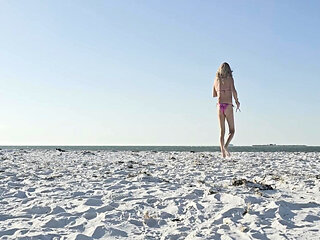 Strolling on the Beach in a hot bikini