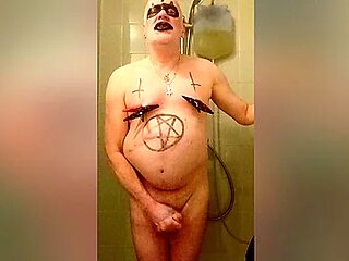 Satan slave takes a perverted piss enema