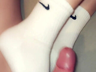 Footjob in Long Socks and Cums on Socks