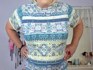 Blonde busty granny tranny cougar Vicki strips for hot young men!