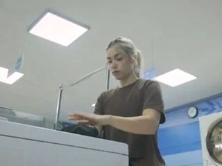 A Lonely Girl Receives Help from a Stranger at the Laundromat