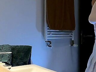 Cute and Hot Sexy Tight Pussy Cheerleader Shows Her Shaved and Wet Pussy Under Her Mini Skirt in the Bathroom