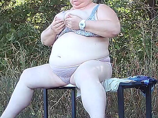 a friend in the park undresses and masturbates on a bench