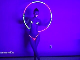 Dances And Hula Hoops Under A Black Light