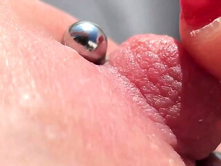 Playing Pierced Nipples Close Up on Balcony