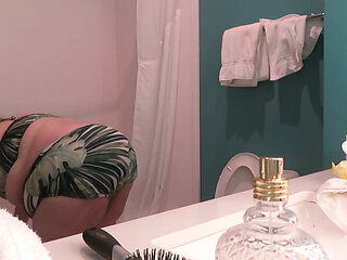 BBW nurse Vicki strips out of new 2 piece bikini set