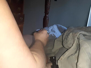 Handjob While Playing in Bed