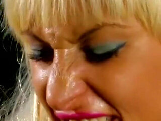 Busty blonde milf is draining dude's hard cock outdoors