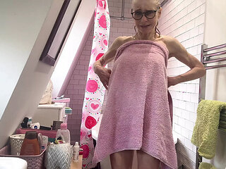 Granny Jacy Creams Her Tight Pussy with a Dildo in 4K