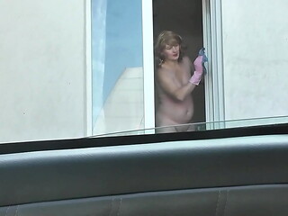 Nude woman neighbor sexy mature Milf without panties and bra washes windows her apartment. A taxi driver watches from car. Solo. Naked in public Peeping Outdoor Outside Publicly Big natural tits Pussy
