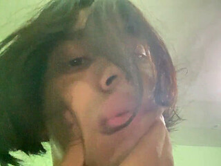 In english, wide open, young ladyboy