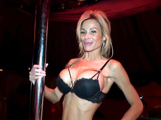 Bimbo Barbi shakes big tits at the strip club before fucking
