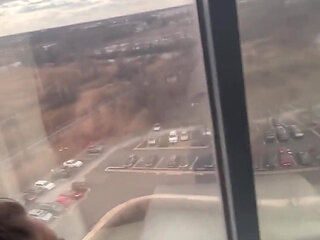 Giving Backshots While Looking Out of 12th Story Hotel