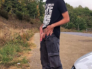 Guy Piss And Cum Near The Highway