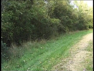 French tranny blowing dick outdoors