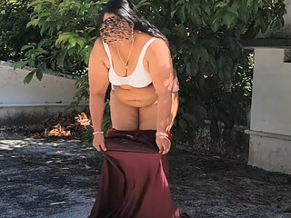 Indian Girl in Red Skirt and White Top