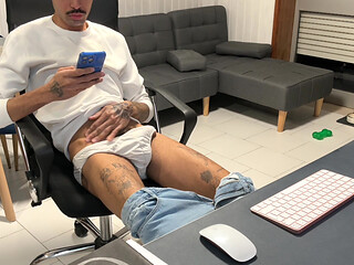 Skinny guy in jeans, pulls his dick out and jerks off on webcam.