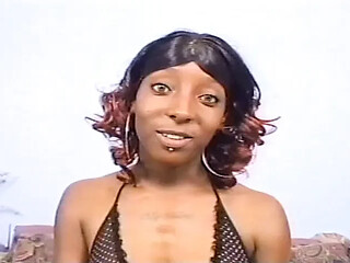 Black beauty blows white cock on vintage show