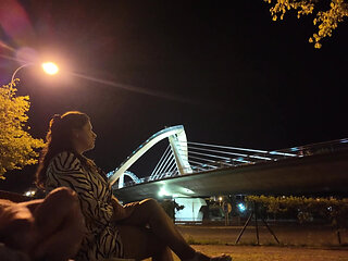 An exhibitionist came to a whore at the spot. She doesn't know what to do with him.