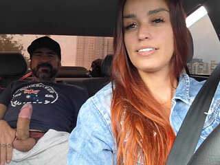 Redhead girl rocks the cock in the car - Amateur Porn