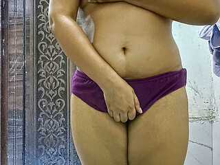 My hot girlfriend is having fun in the bathroom in sexy poses, bra and panties